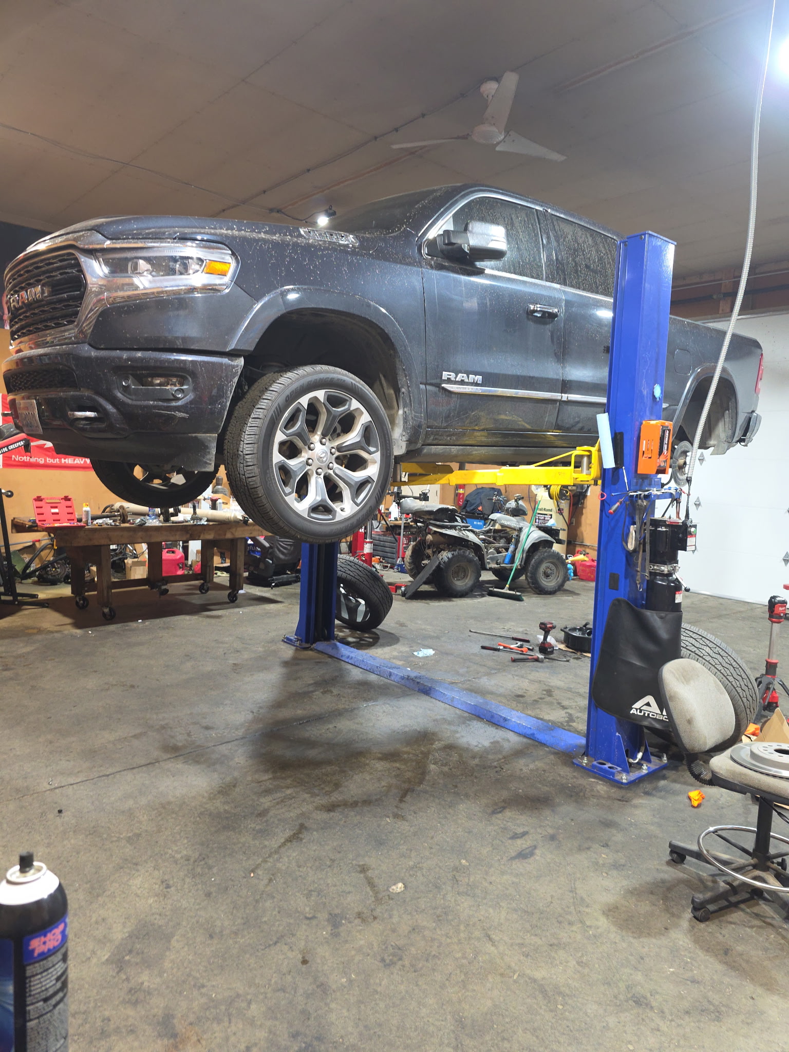 RAM pickup on two-post lift for service